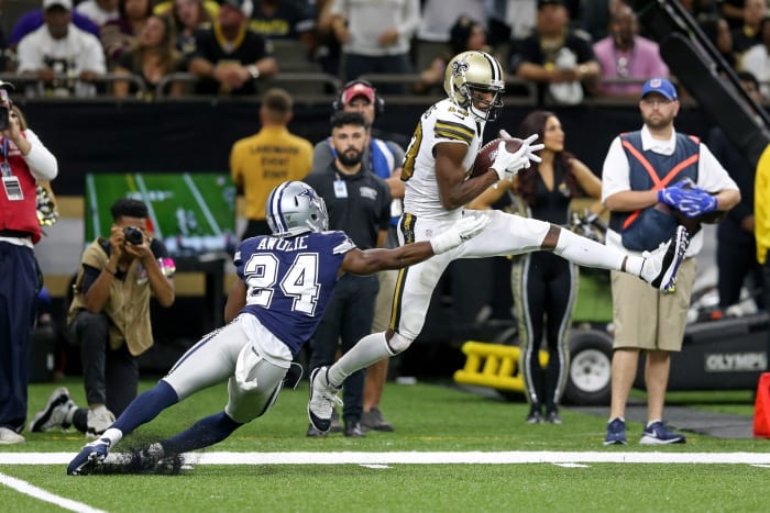 New Orleans Saints receiver Michael Thomas (13) makes a catch in front of Cowboys cornerback Chidobe Awuzie (24). Mandatory Credit: Chuck Cook-USA TODAY
